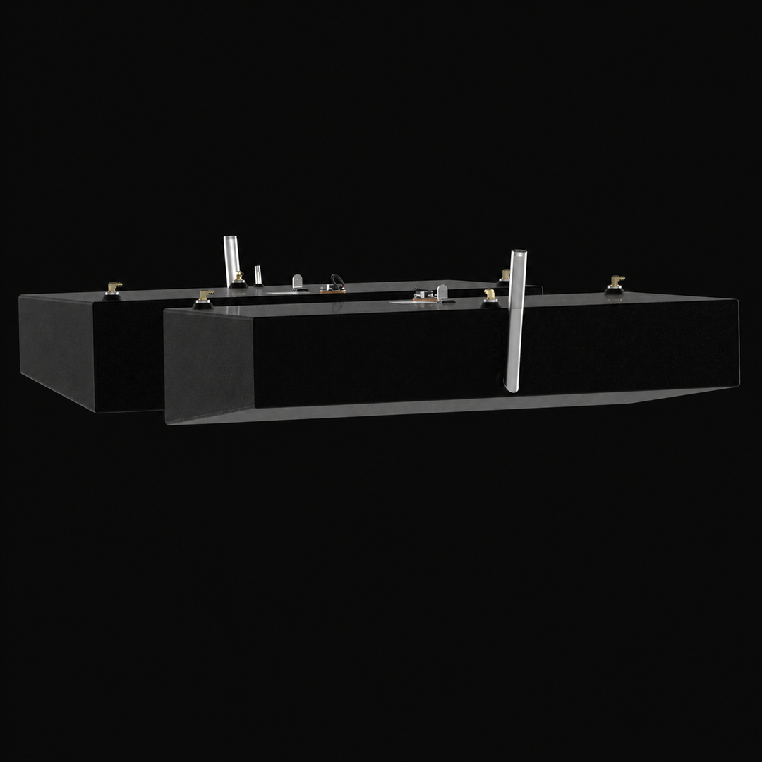 A low-angle side-elevation profile view of a pair of black Shamrock 25-9 Saddle (2-tank combo) replacement marine fuel tanks from file image_734b54.jpg, isolated against a black background. This staggered port and starboard matching pair highlights the long, shallow rectangular profile of the 52-gallon outboard fuel cells, displaying a distinct longitudinal bottom-edge bevel engineered by Welding World to conform perfectly to the vessel's outer deadrise and sit securely within the side hull cavities. Precis
