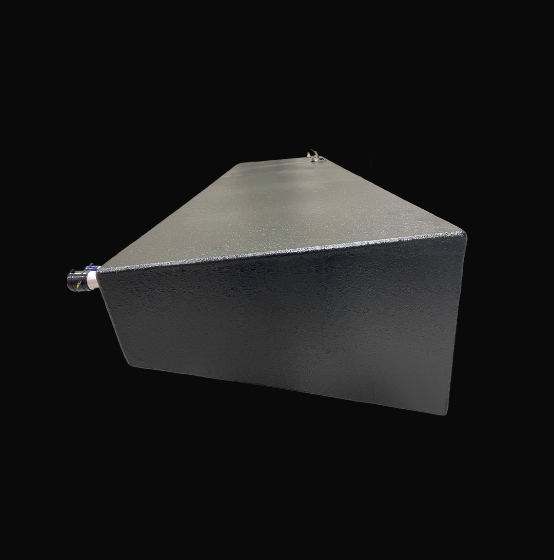 A low-angle perspective view of a Sonic 31 replacement fuel tank highlighting the durable black Coal Tar Epoxy coating. This heavy-duty .190" marine-grade aluminum tank features an exact OEM tapered hull design and precision 316 stainless steel fuel pickups. Engineered for maximum saltwater corrosion resistance, this tank is a guaranteed 100% drop-in replacement for high-performance offshore vessels.