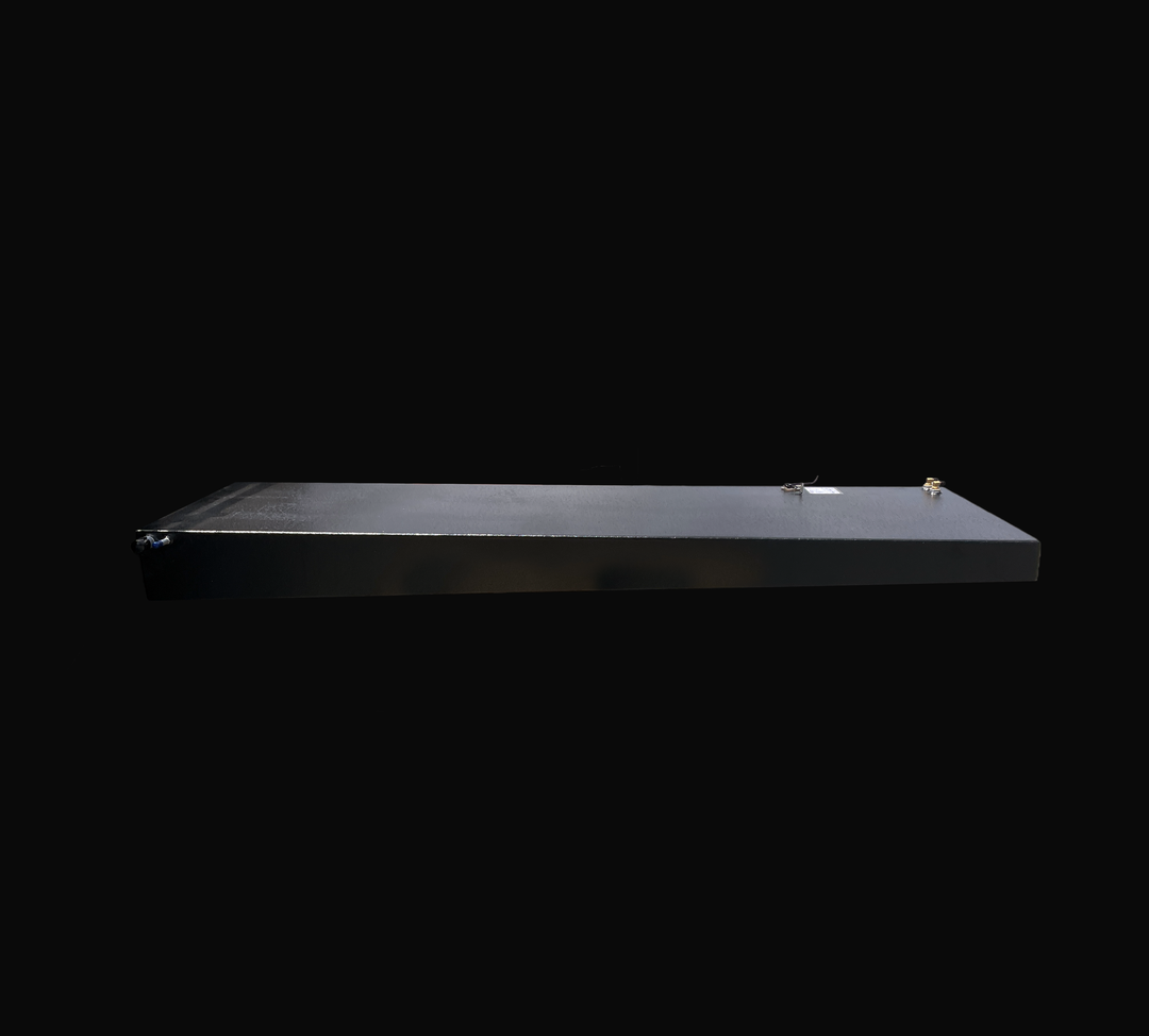 Long-profile side view of a Sonic 31 replacement fuel tank featuring a high-durability black Coal Tar Epoxy finish. This heavy-duty marine-grade .190" aluminum tank is precision-welded with top-mounted 316 stainless steel fuel fittings and an integrated sending unit. Engineered as an exact OEM replacement for offshore vessels, it ensures a guaranteed 100% drop-in fit and superior corrosion resistance in saltwater environments.