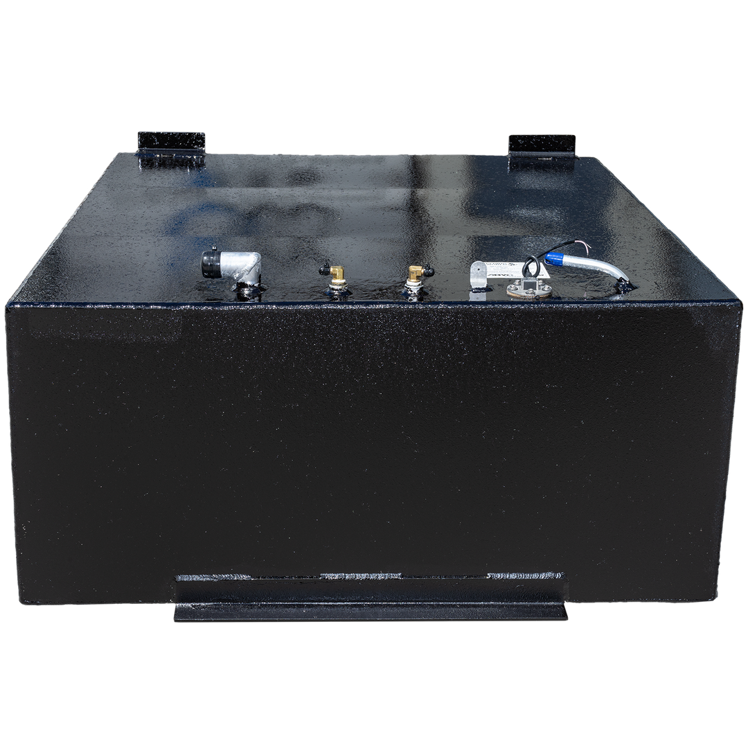 A black, rectangular fuel tank with a textured surface, featuring various metallic fittings and a small hose connection on its top. Two flat mounting brackets are visible on the top edge, and a horizontal, raised strip is present along the bottom front of the tank