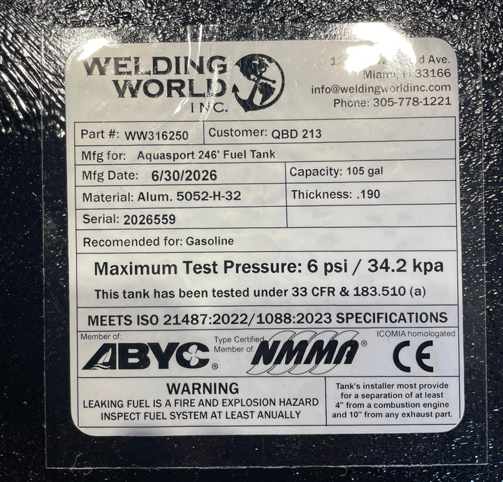 A crisp, close-up top-down view of the official manufacturer specification data placard and certification label from file image_ee6a1f.jpg, permanently affixed to a black encapsulated Aquasport 246 replacement marine fuel tank. The white, weather-resistant technical ID tag prominently displays the Welding World Inc. logo and Miami, FL contact information alongside critical engineering metrics, including Part # WW316250, a production date of 6/30/2026, a total capacity of 105 gallons, and heavy-duty structur