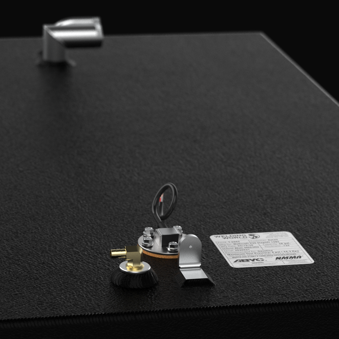 Detailed view of the top-mounted hardware on a 1985 Wellcraft V20 Steplift replacement fuel tank. The image highlights the Coal Tar Epoxy textured finish, a pre-installed fuel sending unit, brass pickup fitting, and grounding tab. A permanent NMMA and ABYC certification label is visible, confirming the tank meets all USCG safety standards for marine gasoline storage.