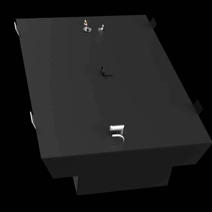 A large black marine fuel tank shaped like a "T," viewed from an elevated front angle against a black background. The tank’s flat top surface features various fittings including a small white pipe in the foreground, two brass connectors near a circular metal plate, a small upright tab, and a central black mounting bracket. The tank edges are clean and sharp, with mounting tabs protruding upward at the corners